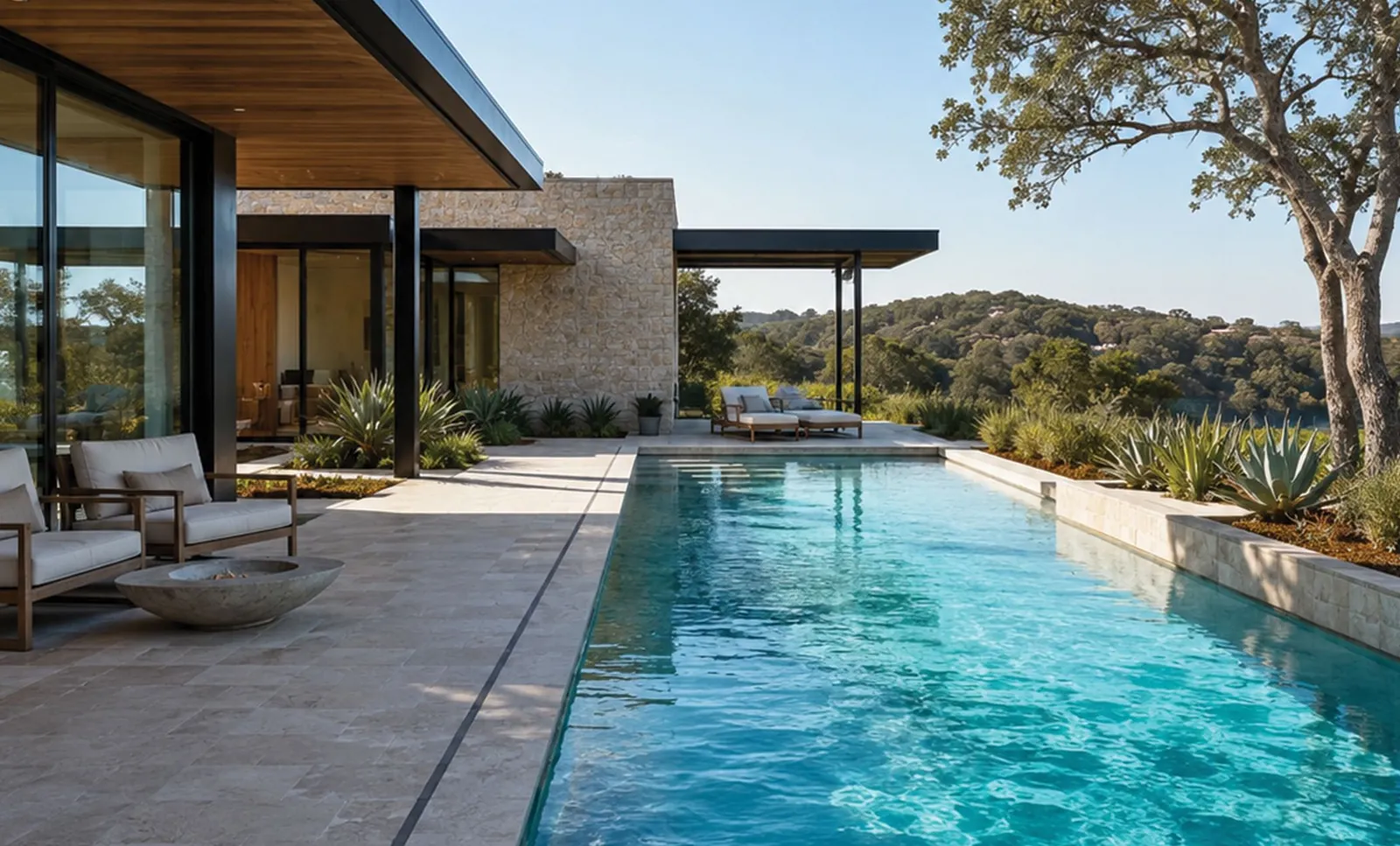 Private pool beside a stone house